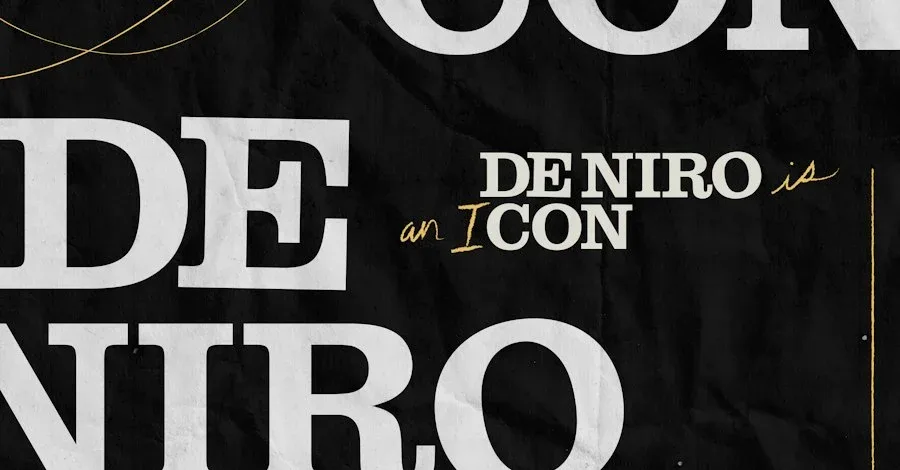 黑色背景上的De Niro Con与An Icon展览标题