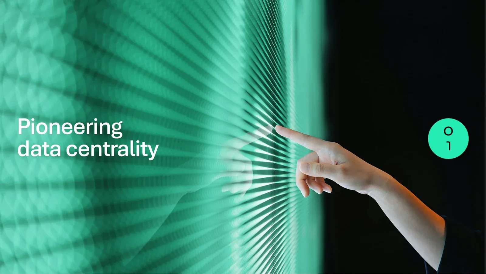 手指触碰绿色光带构成的墙面，画面呈现Pioneering data centrality字样。